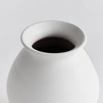 Close-up on the flared rim and upper body highlighting the matte glaze texture and ribbing details
