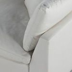 Detailed view of stitching and seams on armrest and cushions