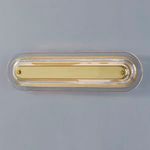 Horizontal orientation of the wall sconce highlighting elongated shape and aged brass center