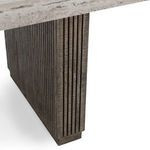 Close-up showing vertical ridges in detail on the dark wood block leg near the tabletop