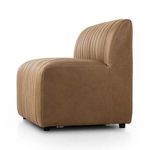 Side profile showing curved armrest, vertical channeling on seat and back, and banquette base feet