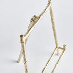 Top rear angle showing gold bamboo-detail with foldable hinge and structural details