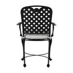 Back view highlighting symmetrical lattice design and curved armrests