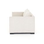 Straight side profile showing high performance fabric texture and squared armrest