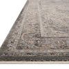 Low-angle side view highlighting the rug’s pile height and fringed edge
