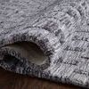 Rolled edge of Yeshaia Grey Charcoal Rug highlighting plush texture and thickness