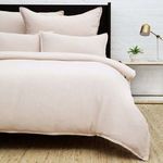 Waverly Big Pillow styled on bed with matching duvet and shams in bright bedroom setting