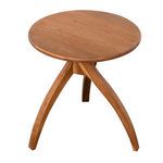 Overhead view showing teak wood grain pattern across the smooth round tabletop
