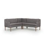 Front-facing angle showing the full L-shape and seating depth of gray linen banquette
