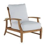 Croquet teak recliner chair with white cushions and curved armrests in a light wood finish