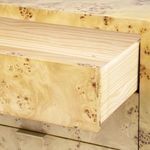 Drawer partially open revealing light natural wood interior contrasting with burl veneer front
