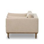 Harlin Chair side profile highlighting flat arm side and fabric texture on wheat upholstery