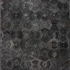 Prescott Charcoal Rug with tone-on-tone geometric pentagon patterns in shades of dark charcoal and high-low textured pile
