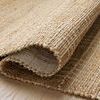 Curled edge detail of Judy Natural Cream Rug highlighting the weave and fiber thickness