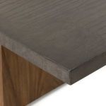 Tabletop surface and paddles positioned on opposite ends with ball in play