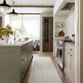 Francis Silver / Sky Rug wool runner displayed in kitchen space with green island and wood floors