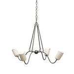 Rafa Chandelier with antique brass finish and oatmeal shades, angled slightly showing the curved iron arms