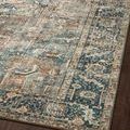 Angled close-up of Margot rug edge highlighting detailed floral border and soft pile texture