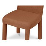 Close-up of Place Dining Chair seat and front legs highlighting upholstery fabric texture.