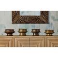 Tanjore Ritual Bowls displayed with two in antique bronze and two in brass finish on wood cabinet under framed art