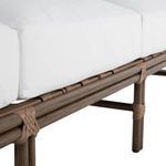 Side angle showing sofa without cushions revealing seat support straps and oak frame structure