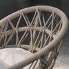 Close-up of Dana Rope Dining Chair arm and back macramé weave pattern in natural linen rope
