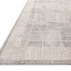 Low angled close-up of rug edge showing flat rectangular shape and pattern details