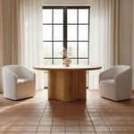 Dining room setting featuring two Sandy Rolling Dining Chairs around a wooden table with terracotta tile flooring