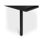 Close-up of rounded black metal tapered leg supporting the nightstand