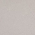 detailed texture shot of tabletop surface showing subtle speckled pattern