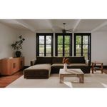 Full living room scene with Bryn sectional against large windows and modern light fixture overhead