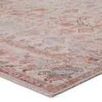Close-up angled view showing soft polyester texture and intricate blush and cream pattern