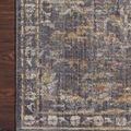 Close-up detail of the Rosemarie Graphite / Multi Rug corner on dark hardwood floor highlighting pattern and finish