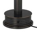 Close-up on sleek ribbed texture of cylindrical lamp stem above round ribbed base