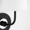 Close-up of Merri sconce fabric shade texture and curved arm joint