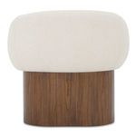 Rear view of Otto accent chair showing smooth curved back and walnut wood veneer base