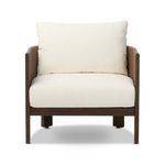 Barrel-backed outdoor chair with simple shaping and linear woven cording finish in brown with white cushions
