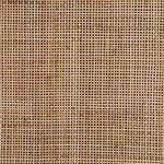 Close-up texture of natural light cane weaving in Carmel Cane Sideboard doors