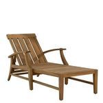 Close-up side view of curved chaise leg and armrest joint fitting