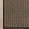 Overhead view showing full Providence Wheat / Charcoal rug flat on light floor with visible weave pattern