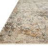 Side angle view showing low pile thickness and textured surface of the Axel Ocean / Beige Rug.