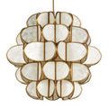 Close-up showing chandelier's layered shell panels with warm light shining through