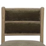 Close-up of Artie Dining Chair backrest showing deep tufting and wood frame detail