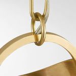 Close-up of brass chain link and oval ring connecting to pendant top with visible electrical cord