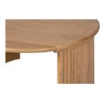 Close-up of rounded edge bevel and fluted vertical oak legs on table corner