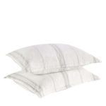 Two gray striped shams stacked with side edge and piping detail visible