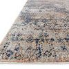 Side view showing low pile height and subtle texture of Anastasia Mist Blue Rug