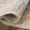 Rolled edge of the rug revealing backside weave and low pile texture
