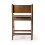 Back view showing leather stretched flat on the backrest with visible wood frame structure