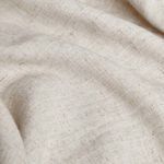 Close-up detail showing fine woven bamboo linen fabric texture and natural beige color